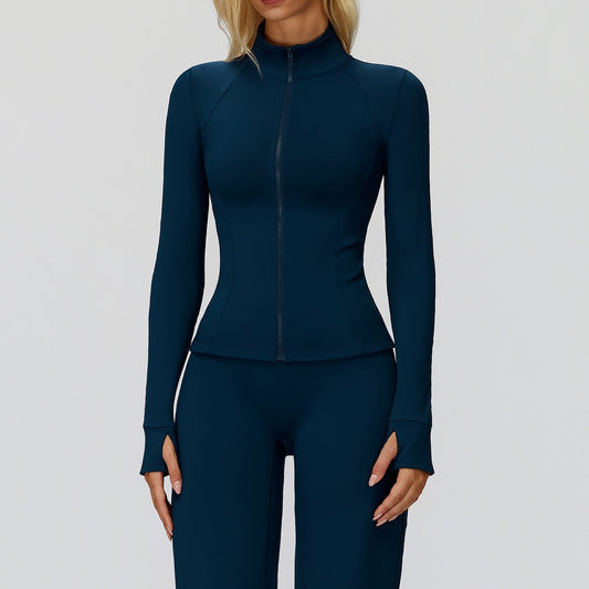 Navy fitted golf jacket zipped up, front view showing the stand collar, contour seams and thumbholes